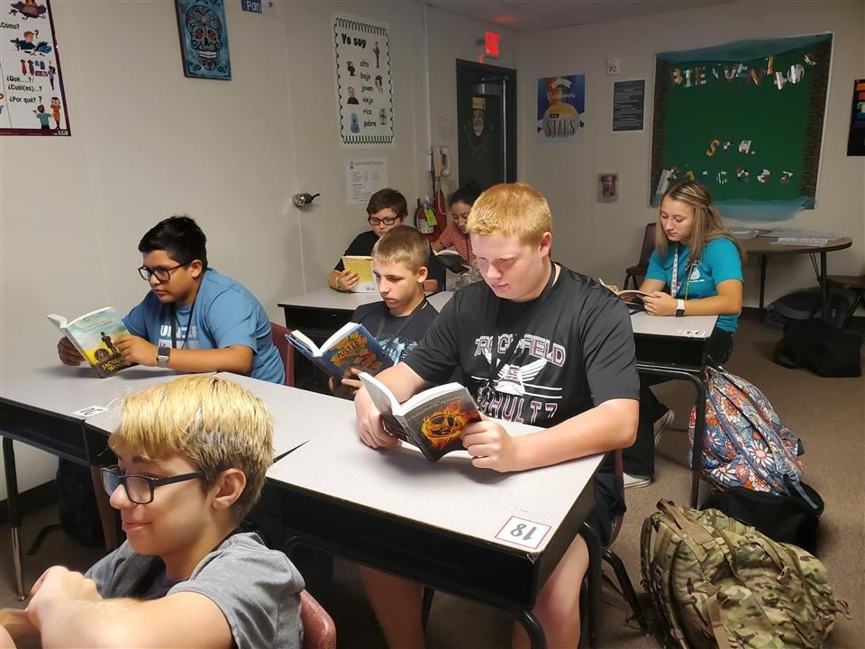 Photo of students reading 